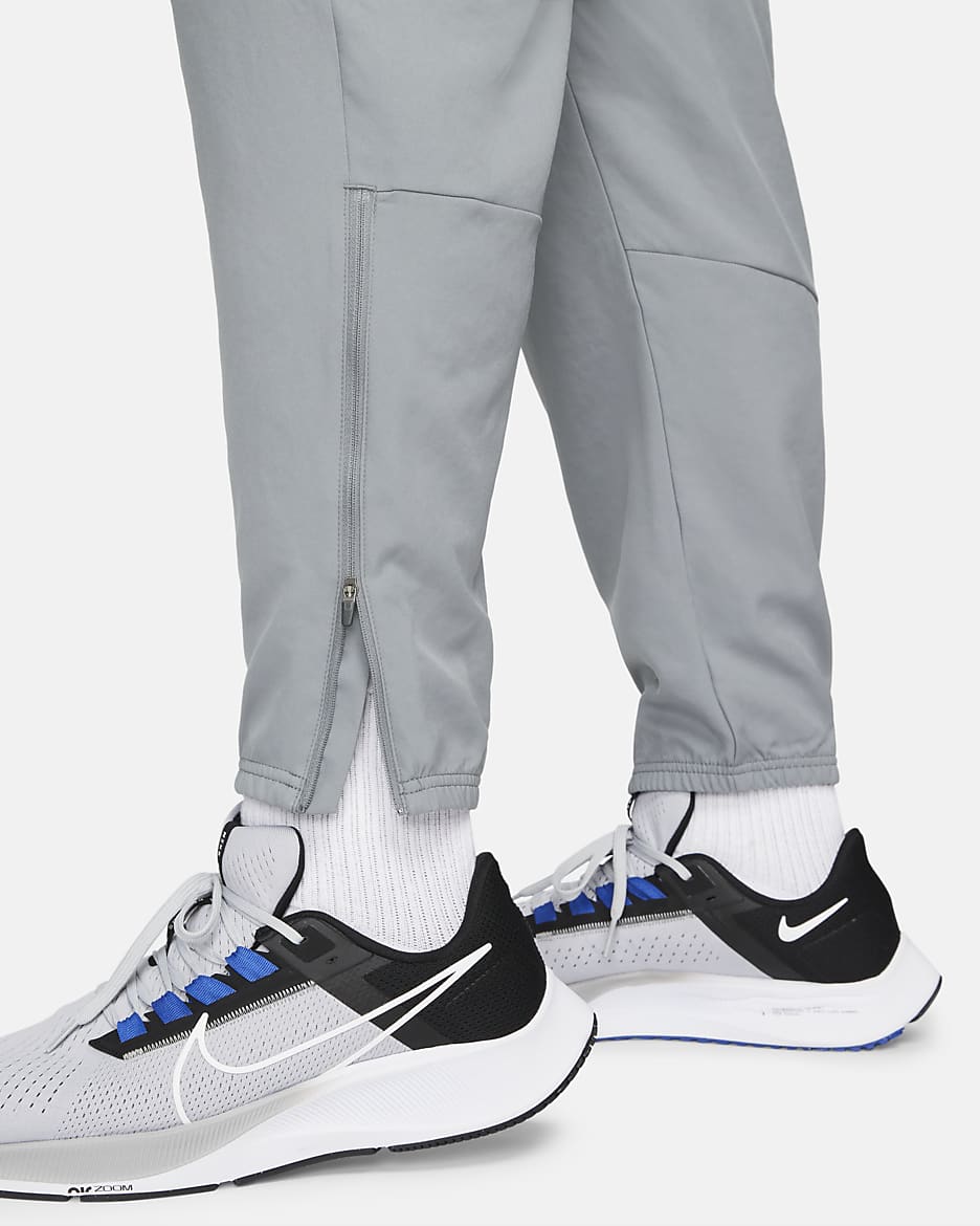 Nike Dri FIT Challenger Men s Woven Running Pants. Nike